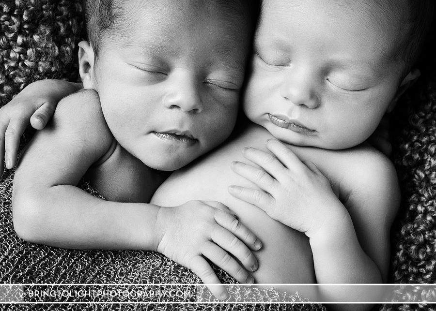 newborn twins black and white